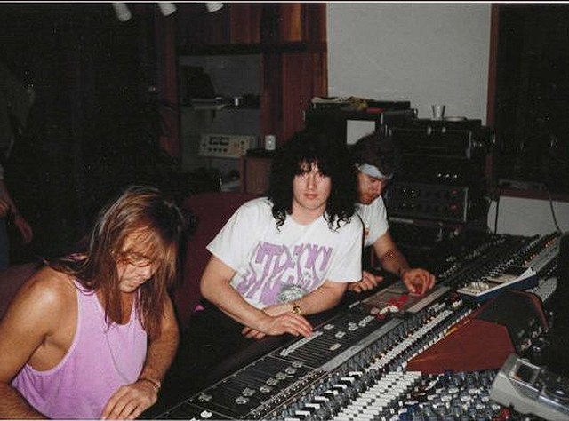 Benny Doro in a recording studio at a mixing console