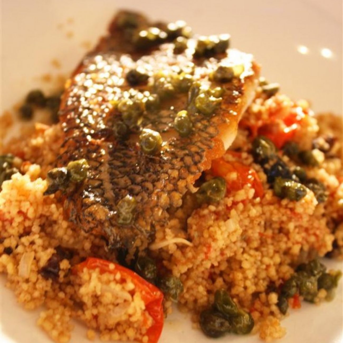Black Seabass with Chinese five spice couscous and Caper butter