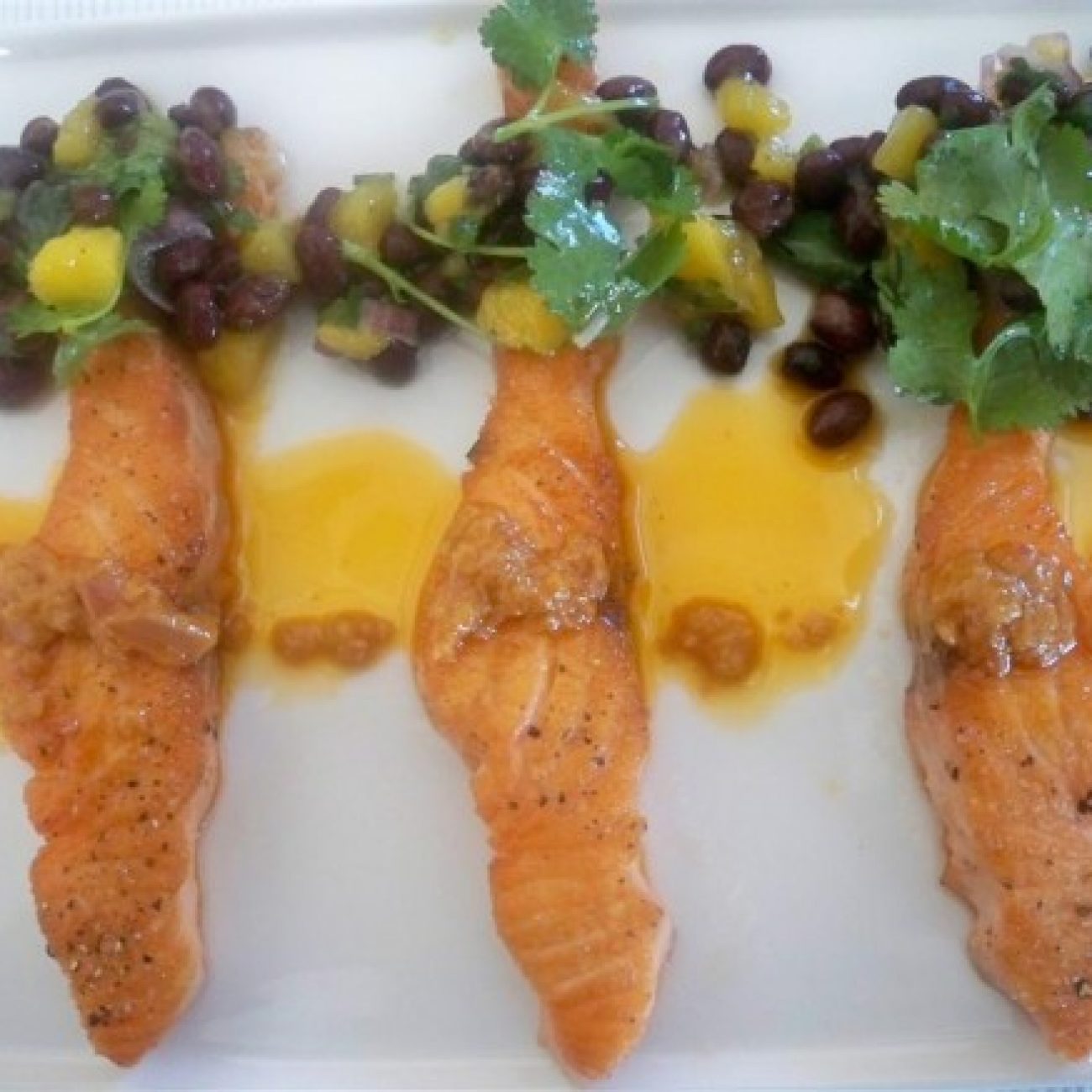 Salmon with blackbean mango salsa and chipolte butter