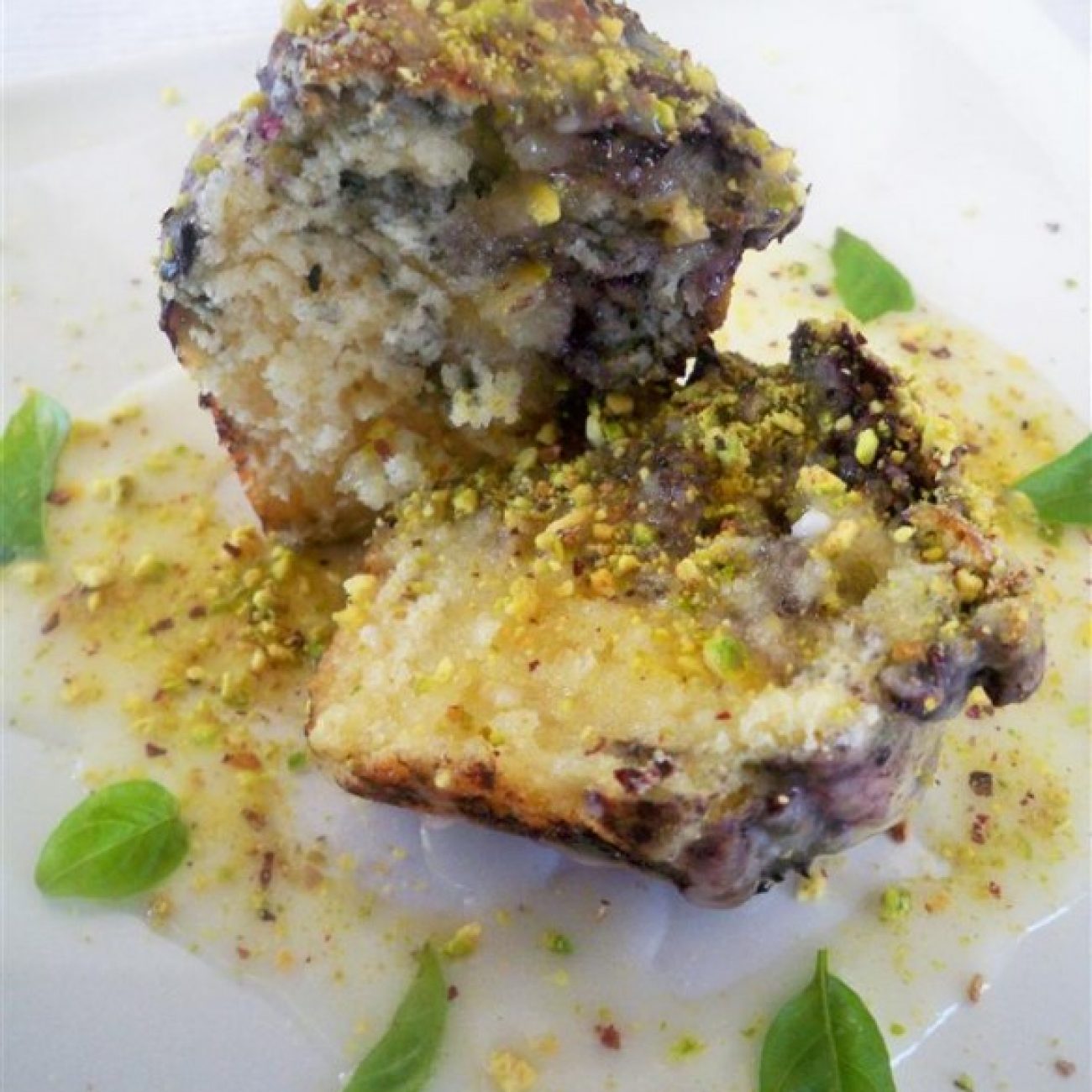 Blueberry Muffins with lemon glaze and crushed pistachios